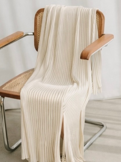 Turn heads in the Priscilla Dress.
A sleek silhouette with elegant draping that flatters every curve